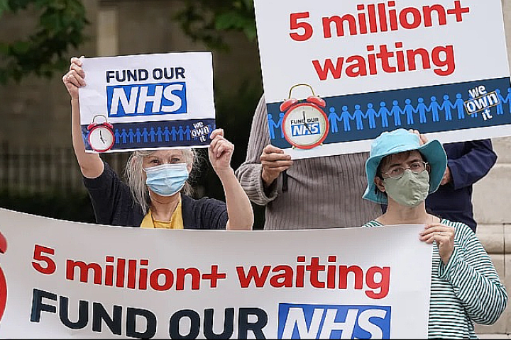 The British NHS is in crisis as patients must wait on endless waiting lists while abused by hospital staff