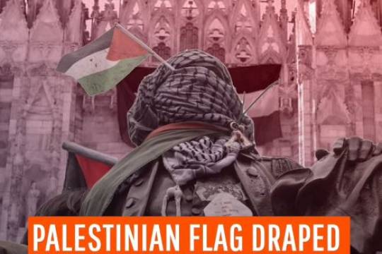 palestinian flag draped on milan cathedral