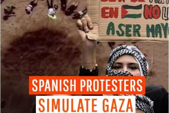 Pro-Palestine activists in Spain dug a hole, one-tenth the size of a real bomb crate