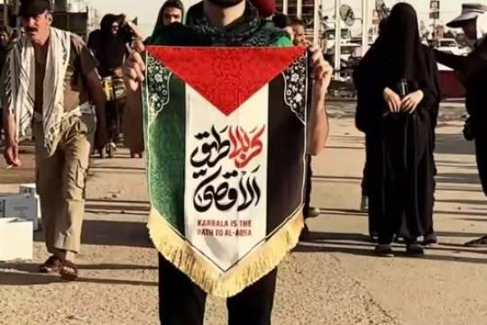 Flash cut of the slogan Karbala through Al-Aqsa