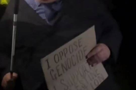 The legend Mack (blind on a wheelchair) getting arrested at 11pm for holding a placard