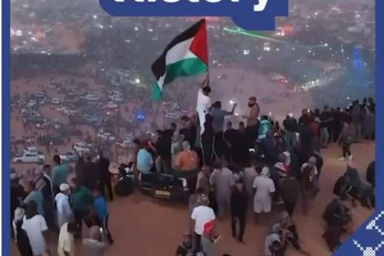 Activists displayed a large banner alongside the Palestinian flag over Germany’s Brandenburg Gate